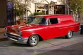 Side view of a beautifully restored 1957 chevy 150 sedan delivery