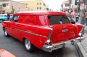 1957 chevy sedan delivery parked at the Huntington Beach Cruisers car show in California