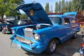 Nicely restored 1957 chevy sedan delivery panel with old-skool cragar mags and new blue paint job