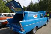 Photo shows the stock one-piece rear hatch door on a restored 1957 chevy sedan delivery