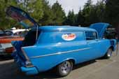 Side view shows the original 150 molding on the side of a nicely restored 1957 chevy sedan delivery wagon